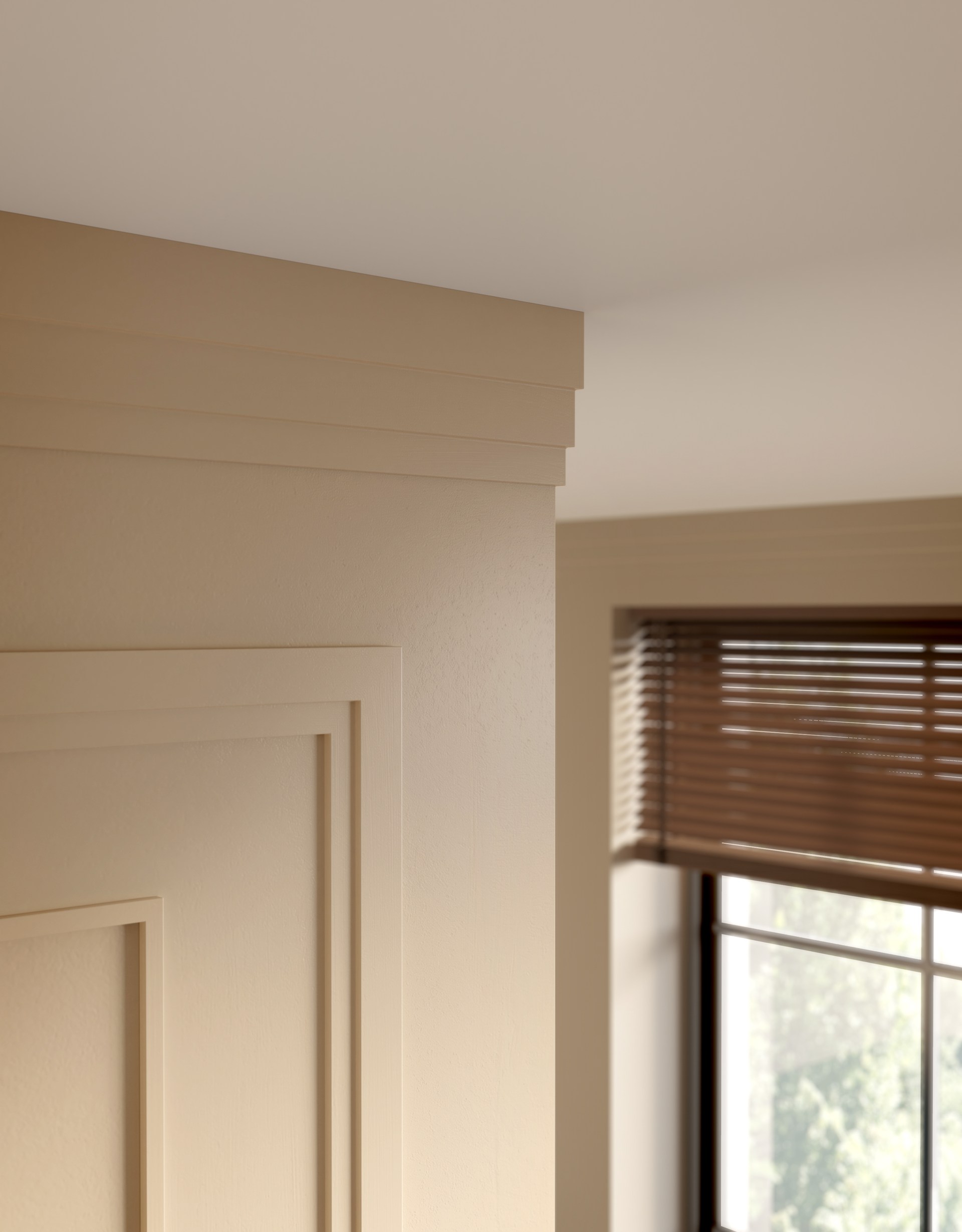 Cornici a più livelli che creano una transizione architettonica pulita tra parete e soffitto.